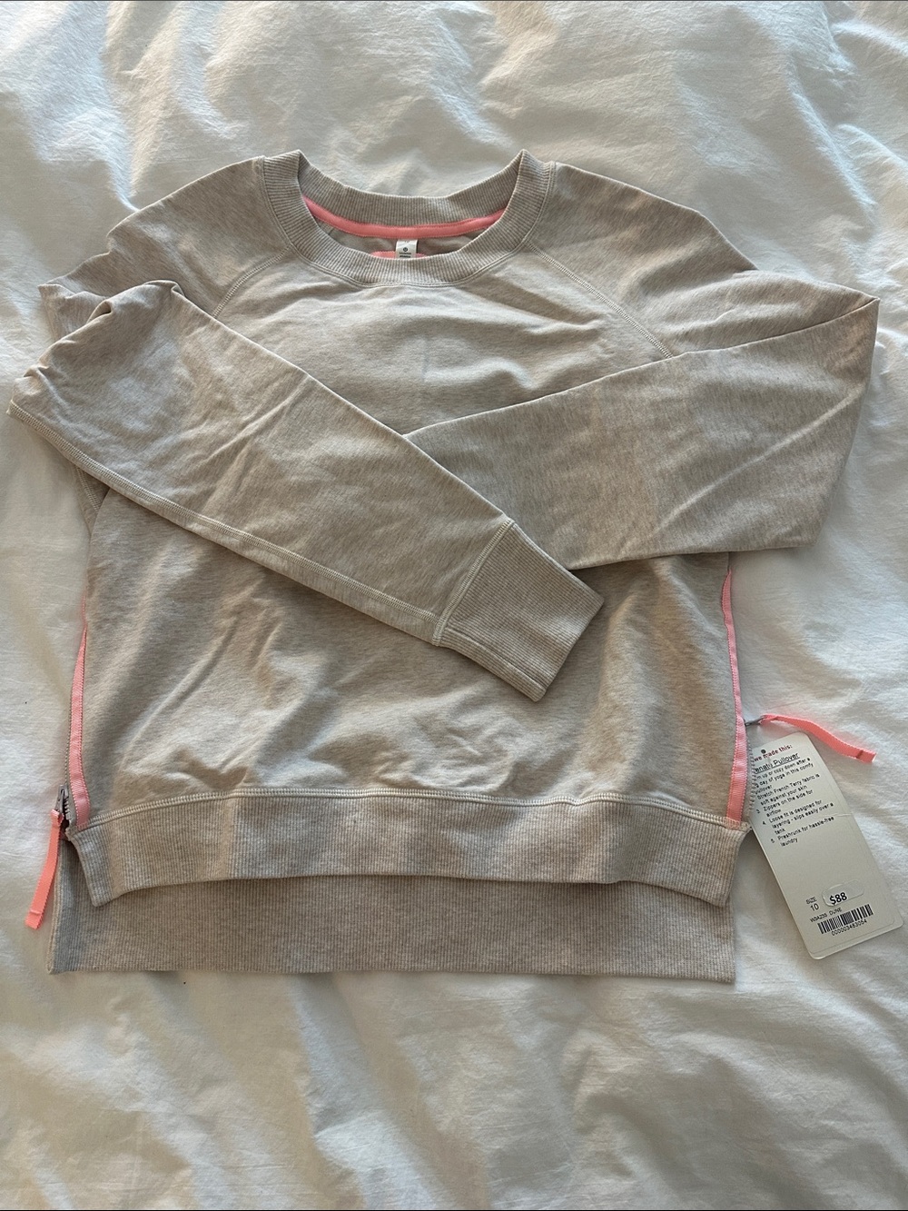 lululemon athletica Cream Rejuvenate Pullover with Pink Trim and zipper sides